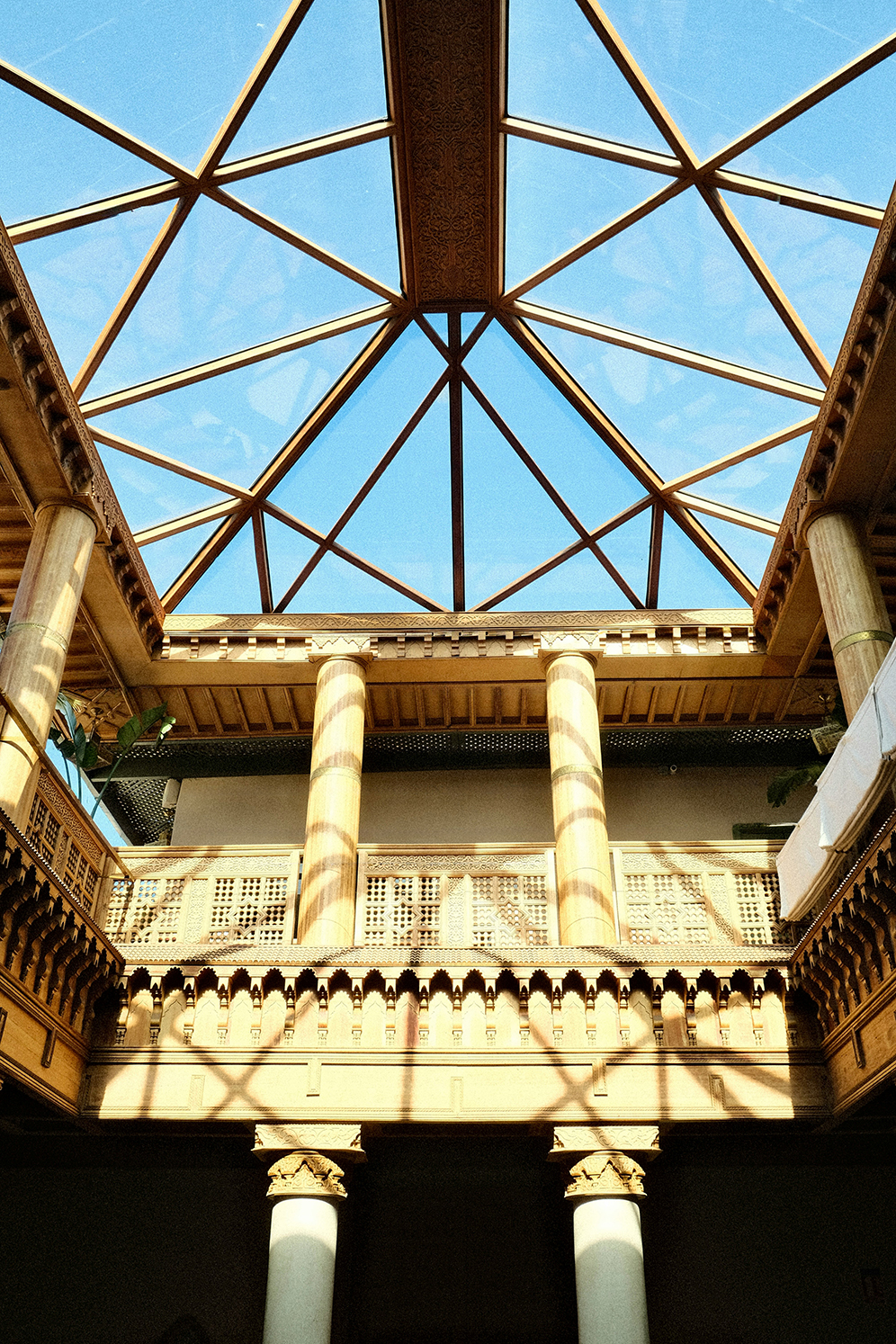 Modern tensile structure workshop with steel beams and fabric installation